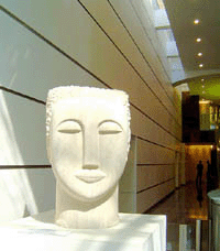 A sculpture at the entrance to our offices.
Click face for details.